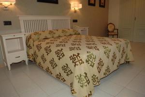 Posteľ alebo postele v izbe v ubytovaní Hostal La Palmera