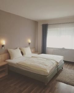 Postel nebo postele na pokoji v ubytování Hotel Ring Park