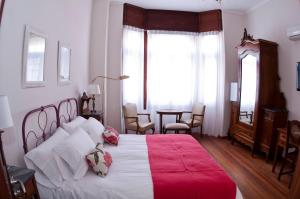 Postel nebo postele na pokoji v ubytování Hotel Papiros