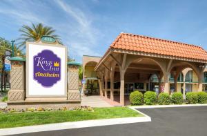 a sign in front of a mall with a building at Kings Inn Anaheim at The Park & Convention Center in Anaheim
