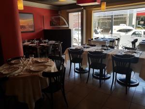 En restaurant eller et andet spisested på Hotel Americano Pergamino