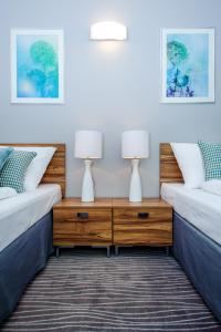 Postel nebo postele na pokoji v ubytování Hotel Active
