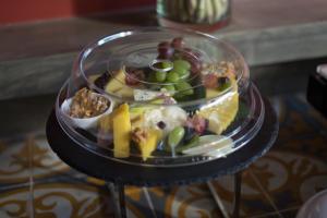 a plate of food on a glass table at Golden Temple Villa in Siem Reap