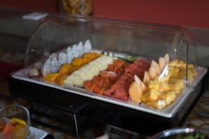 a display case filled with different types of food at Golden Temple Villa in Siem Reap