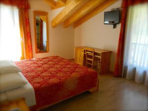 Cama o camas de una habitación en Albergo Montecroce