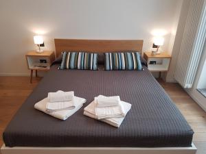 Voodi või voodid majutusasutuse Milano Navigli Apartment - Via Tortona toas