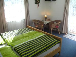 Postel nebo postele na pokoji v ubytování Pension Reindlhöh