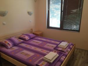 A bed or beds in a room at Apartment Martin Beach