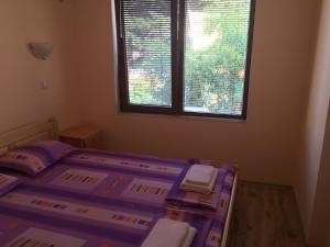 A bed or beds in a room at Apartment Martin Beach