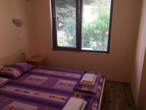 A bed or beds in a room at Apartment Martin Beach