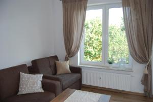 Posedenie v ubytovaní Apartament Piaskowy Polanki Park
