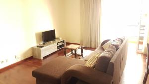TV a/nebo společenská místnost v ubytování Dorisol I Casa Branca Apartment by Rentallido