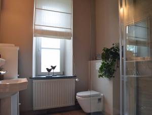Kylpyhuone majoituspaikassa Les Glaneuses