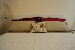 A bed or beds in a room at La Casetta