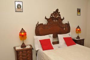 A bed or beds in a room at GuestHouse Arcela