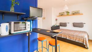 Kuchyň nebo kuchyňský kout v ubytování Sunny Apartments + 21 fotografií