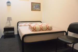 Postel nebo postele na pokoji v ubytování Elizabeth Hostel