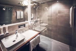 Koupelna v ubytování Das Sonnreich - Thermenhotel Loipersdorf
