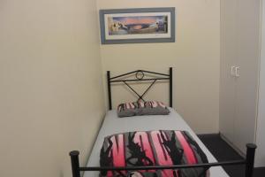 Postel nebo postele na pokoji v ubytování Elizabeth Hostel
