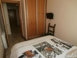 Posteľ alebo postele v izbe v ubytovaní Apartamento Edificio Serraneu. Sierra Nevada. Granada