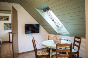 TV a/nebo společenská místnost v ubytování Penzion u Lupíků