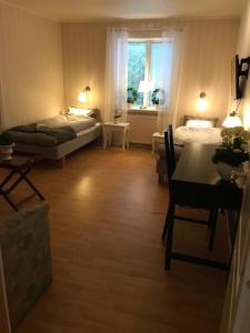 Postel nebo postele na pokoji v ubytování Skärplinge Gästis B&B