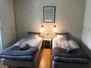 Postel nebo postele na pokoji v ubytování Skärplinge Gästis B&B