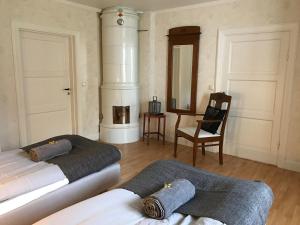 Postel nebo postele na pokoji v ubytování Skärplinge Gästis B&B