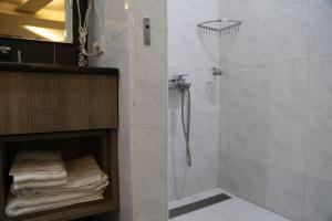 Koupelna v ubytování 德瑞旅店Direct Hotel + 24 fotografií