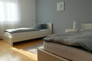 Posteľ alebo postele v izbe v ubytovaní Ferienwohnung Elsa