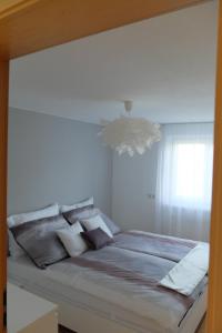 Posteľ alebo postele v izbe v ubytovaní Ferienwohnung Elsa
