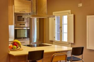 A kitchen or kitchenette at Central Flat