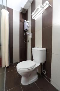 Koupelna v ubytování 1 Hotel Taman Connaught