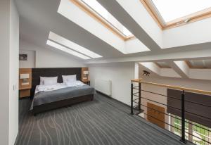 Säng eller sängar i ett rum på Aparthotel BC 29 Residence