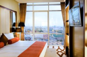 Postel nebo postele na pokoji v ubytování Bayat Hotel