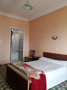 Katil atau katil-katil dalam bilik di Hotel Le Gardenia (ex Lutetia)