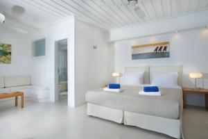 Posteľ alebo postele v izbe v ubytovaní Selana Suites