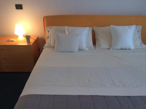 Postel nebo postele na pokoji v ubytování CASA "T"
