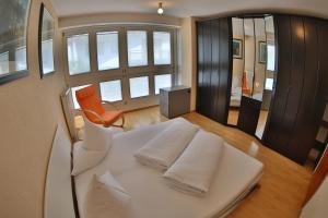 Tempat tidur dalam kamar di Ferienhaus Moidl