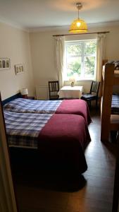 Postel nebo postele na pokoji v ubytování Kilcommon Lodge Holiday Hostel + 22 fotografií