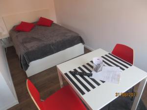 Łóżko lub łóżka w pokoju w obiekcie Stay99