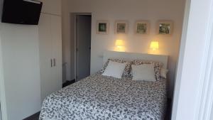 Katil atau katil-katil dalam bilik di Estrena loft en el mejor sitio de Tarragona