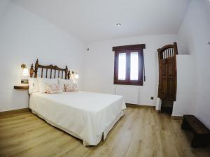 Postel nebo postele na pokoji v ubytování Navazos