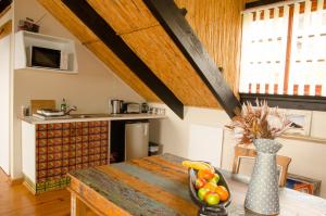 Kuchyň nebo kuchyňský kout v ubytování Sundowner Loft