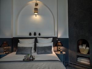 Postel nebo postele na pokoji v ubytování Riad 64 Maison D'hôtes & Spa