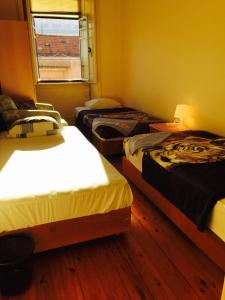 Postel nebo postele na pokoji v ubytování LisBangla Guest House