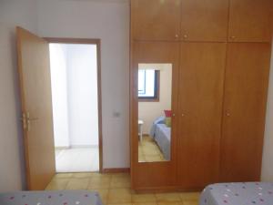 Łóżko lub łóżka w pokoju w obiekcie Apartamento Medanero FGF