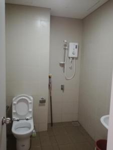 a bathroom with a toilet and a shower at i-city i-soho in Shah Alam