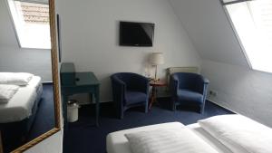 Ein Bett oder Betten in einem Zimmer der Unterkunft Waldhaus an de Miälkwellen