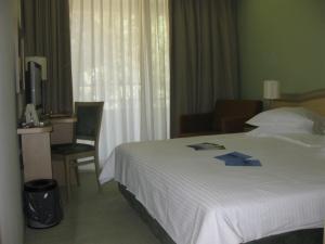 Кровать или кровати в номере Hotel Kimen